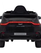 Aston Martin Masinuta electrica pentru copii DBX negru 100W cu telecomanda suspensii lumini panou audio scaun piele si roti din spuma Eva