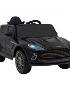 Aston Martin Masinuta electrica pentru copii DBX negru 100W cu telecomanda suspensii lumini panou audio scaun piele si roti din spuma Eva