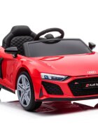 Audi Masinuta electrica copii R8 Red cu licentaacumulator 12V 78Wscaun din piele si roti EVA bluetooth display usi cu deschidere muzicaUSB lumini LED oglinzi retrovizoare pornire la butonsarcina maxima 30 kg