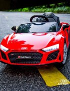 Audi Masinuta electrica copii R8 Red cu licentaacumulator 12V 78Wscaun din piele si roti EVA bluetooth display usi cu deschidere muzicaUSB lumini LED oglinzi retrovizoare pornire la butonsarcina maxima 30 kg