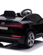 Audi Masinuta electrica pentru copii E-Tron SportBack Black cu licentaroti evascaun pieleacumulator 12Vsuspensiisistem trollerusi cu deschidereslow startlumini LEDmp3usboglinzi retrovizoaresarcina maxima 30 kg