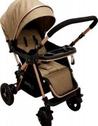 Baby Care Carucior pentru copii PRO 511 Maro Cadru aluminiu Maner reversibil Spatar reglabil in 5 trepte Amortizoare Frana picior Pliabil
