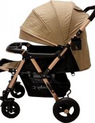Baby Care Carucior pentru copii PRO 511 Maro Cadru aluminiu Maner reversibil Spatar reglabil in 5 trepte Amortizoare Frana picior Pliabil