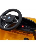 BMW Masinuta electrica pentru copii M4 galben70W cu telecomanda amortizoare lumini panou audio scaun piele si roti din spuma Eva