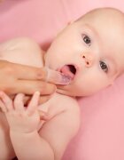 Bocioland Degetar din silicon pentru masarea gingiilor cu carcasa de protectie inclusa