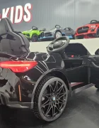 Cars4Kids Masinuta electrica pentru copii BMW M4 Negru Metalic 12V licenta oficiala telecomanda 2.4G scaun piele