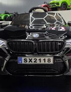 Cars4Kids Masinuta electrica pentru copii BMW M5 Negru Metalic 24V licenta oficiala telecomanda 2.4G scaun din piele