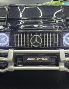 Cars4Kids Masinuta electrica pentru copii Mercedes G63 AMG Negru Metalic 24V 2 locuri licenta oficiala telecomanda 2.4G