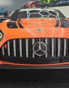 Cars4Kids Masinuta electrica pentru copii Mercedes GT3 AMG Portocaliu 12V licenta oficiala telecomanda 2.4G scaun piele deschidere usi