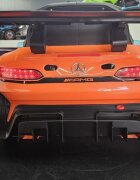 Cars4Kids Masinuta electrica pentru copii Mercedes GT3 AMG Portocaliu 12V licenta oficiala telecomanda 2.4G scaun piele deschidere usi