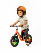 Chillafish Bicicleta copii fara pedale Charlie Glow Orange 10 inch roti din spuma Eva scaun reglabil de la 28-37 cm ghidon ajutabil de la 476-504 cm cadru usor varsta recomandata 18-48 luni spite stralucitoare