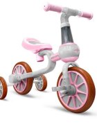 Ecotoys Bicicleta copii cu roti ajutatoare LC-V1311 roz de la 2 ani pana la 20 kg inaltime ajustabila sa 33-36cm poate fi folosita in 4 configuratii