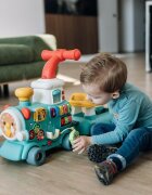 Free2Move Antemergator Magic Train Green 5 in 1 cu diverse activitati de joaca panou educational efecte sonore si luminoase