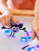 Glo Pals Jucarie senzoriala luminoasa de baie Lumi Glo Pal mov