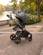 Kidnort Carucior reversibil pentru copii cu pliere compacta spatar si viziera reglabile Isbjorn Arctic Grey pana la 22 kg roti cu suspensii accesorii incluse suport pentru pahar