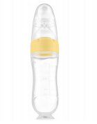 Kidnort Lingurita pentru copii din silicon cu rezervor gradat 90 ml si ventuza de prindere Retter Sommar Yellow