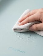 Kidnort Salteluta de infasat pentru bebelusi Laer Frost Grey din spuma moale impermeabila moderna si ergonomica cu baza antiderapanta centura de siguranta reglabila si margini ridicate dimensiune 71.5 x 52 x 7.5 cm