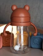 Kidnort Sticluta de apa din tritan pentru copii Bringebaer sterilizabila pai moale din silicon cu biluta gravitationala maner ergonomic capacitate 300 ml Brown