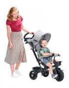 KINDERKRAFT Tricicleta pentru copii Aveo Light Grey de la 9 luni cu sezut rotativ suport pentru picioare maner cu control al directiei gentuta si cos pentru accesorii