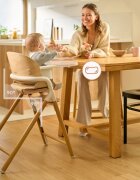 Lionelo Scaun de masa multifunctional Celia din lemn de fag 6 luni- adult reglabil pe inaltime husa impermeabila tavita silicon suport de picioare reglabil greutate maxima 90 Kg AlbNatural