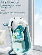Little Mom Cadita bebelusi pliabila Dino Blue include o perna de siguranta detasabila termometru cu display digitalprotectie anti-alunecare 87x51x23 cm