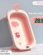 Little Mom Cadita bebelusi pliabila Dino Pink include o perna de siguranta detasabila termometru cu display digital protectie anti-alunecare 87x51x23 cm