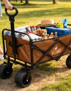 Luaro Carucior de transport universal 2 in 1 Ikonka Brown model pliabil cu maner reglabil sasiu din otel rezistent buzunare exterioare si Masuta de campare inclusa