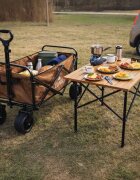 Luaro Carucior de transport universal 2 in 1 Ikonka Brown model pliabil cu maner reglabil sasiu din otel rezistent buzunare exterioare si Masuta de campare inclusa