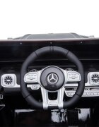 MERCEDES-BENZ Masinuta electrica pentru copii cu licenta Mercedes Benz AMG G63 Black cu telecomanda 2.4G2 motoarex35wRoti EVAScaun din pieleDeschidere usiLumini LEDSuspensiiVolan cu functiiPornire la buton