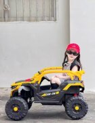 Nichiduta Masinuta electrica de teren pentru copii Can CN UTV Drive Yellow 12V cu telecomanda 2.4G2 motoare 38Wlumini LEDsuspensii spateroti late rezistentemargine de siguranta rabatabilasunete si muzicafunctie swing