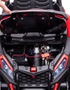 Nichiduta Masinuta electrica pentru 2 copii UTV Racing Pink 12Vtelecomanda 2.4Gusi cu deschiderefaruri ledpornire la butonmuzicacentura de sigurantaslow startcapota realista cu deschidere