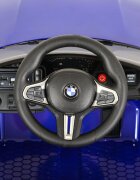 Nichiduta Masinuta electrica pentru copii BMW M4 Painted Blue 12V 90W cu echipare premium deschidere usi si licenta panou audio roti din spuma Eva pornire la buton lumini si telecomanda