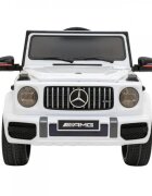Novokids Masinuta electrica pentru copii Mercedes G63 AMG Alb roti din cauciuc Eva melodii si USB usi cu deschidere 12V 2 viteze lungime 120 cm 2 motoare de 25 W