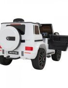 Novokids Masinuta electrica pentru copii Mercedes G63 AMG Alb roti din cauciuc Eva melodii si USB usi cu deschidere 12V 2 viteze lungime 120 cm 2 motoare de 25 W