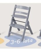 Nukido Scaun de masa evolutiv Nelo GriAlb din lemn natural6 luni-12 ani (Max 50kg) tava detasabila si perna moale inclusa inaltime reglabila in 6 trepte centura de siguranta