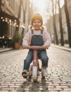 Petite&Mars Bicicletatricicleta pentru copii PetiteMars Bingo Roz 3 in 1 multifunctionala cu pedale detasabile ghidon directionabil sa reglabila pe inaltime 2.3 kg greutate admisa 25 kg 12-36 luni