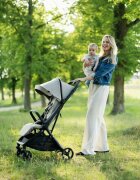 Petite&Mars Carucior pentru copii PetiteMars Flip verde cu pliere compacta spatar reglabil suport picioare reglabil si copertina extensibila cu protectie UPF 50+ greutate admisa 22 kg