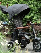 QPlay Tricicleta pentru copii Rito Deluxe negru pliabila cu scaun inalt matlasat ajustabil in 2 pozitii maner cu control al directiei frana dubla copertina XXL detalii de piele ecologica