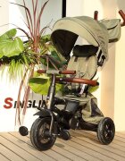 QPlay Tricicleta pentru copii Rito Deluxe verde-maslina pliabila cu scaun inalt matlasat ajustabil in 2 pozitii maner cu control al directiei frana dubla copertina XXL detalii de piele ecologica