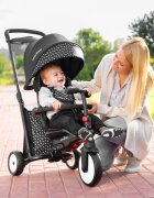 SMART TRIKE Tricicleta pentru copii STR5 BlackWhite 7 in 1 ultrapliabila dotata cu frana scaun rabatabil de la 6 luni sistem patentat cu tehnologie Touch Steering