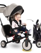 SMART TRIKE Tricicleta pentru copii STR7 Warm Grey 7 in 1 ultrapliabila spatar reglabil sistem patentat Touch Steering roti din cauciuc cu functie de absorbire a socurilor varsta 6 luni+