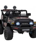 Toyota Masinuta electrica pentru copii FJ Cruiser 4x4 negru 90W cu telecomanda sunete suspensii lumini panou audio scaun piele si roti din spuma Eva