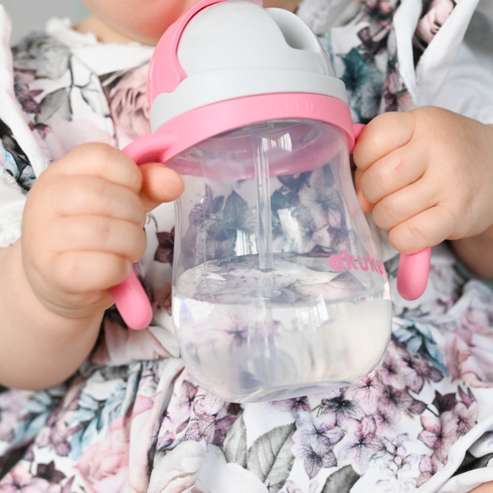 Akuku Cana de antrenament Pink 280ml anti-varsare cu manere si pai cu greutatecapac mobil de protectie