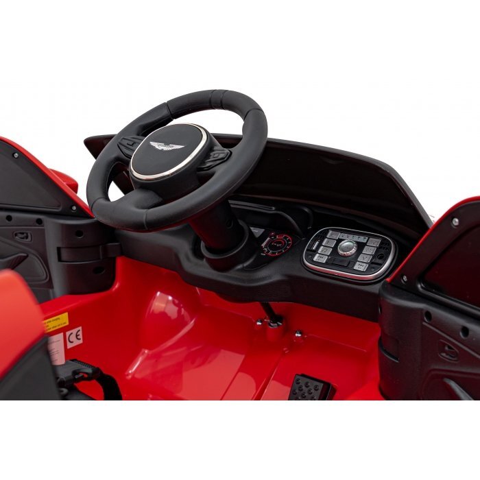 Aston Martin Masinuta electrica pentru copii DBX rosu 100W cu telecomanda suspensii lumini panou audio scaun piele si roti din spuma Eva