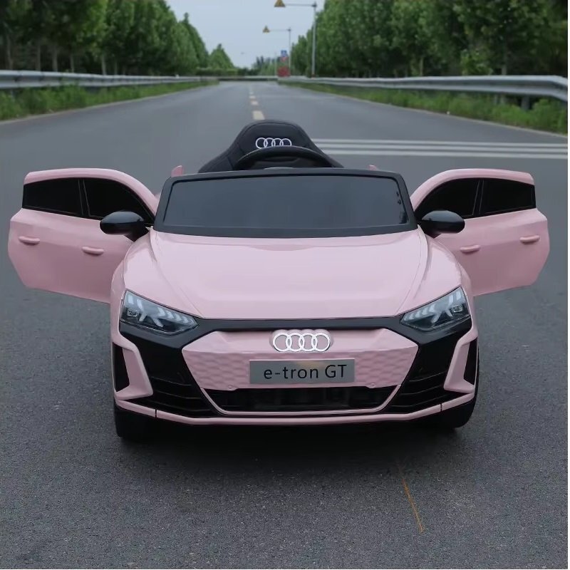Audi Masinuta electrica pentru copii e-Tron GT Pink cu licentaradiocomanda 2.4Groti EVAdoua motoareacumulator 12Vfaruri si stopuri LEDacumulator 12V45Ahdoua motoareoglinzi retrovizoareunitate o cu muzica