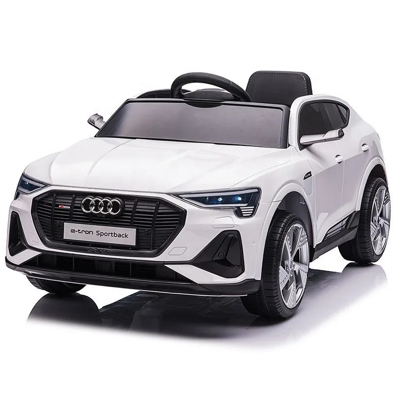 Audi Masinuta electrica pentru copii E-Tron SportBack White cu licentaroti evascaun pieleacumulator 12Vsuspensiisistem trollerusi cu deschidereslow startlumini LEDmp3usboglinzi retrovizoaresarcina maxima 30 kg