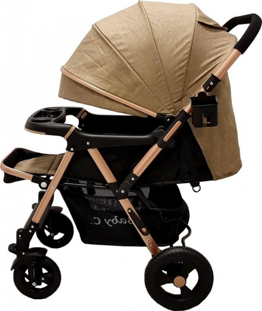 Baby Care Carucior pentru copii PRO 511 Maro Cadru aluminiu Maner reversibil Spatar reglabil in 5 trepte Amortizoare Frana picior Pliabil