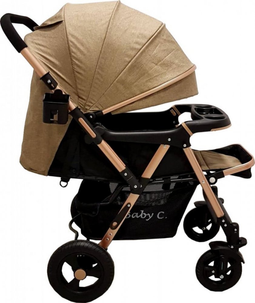 Baby Care Carucior pentru copii PRO 511 Maro Cadru aluminiu Maner reversibil Spatar reglabil in 5 trepte Amortizoare Frana picior Pliabil