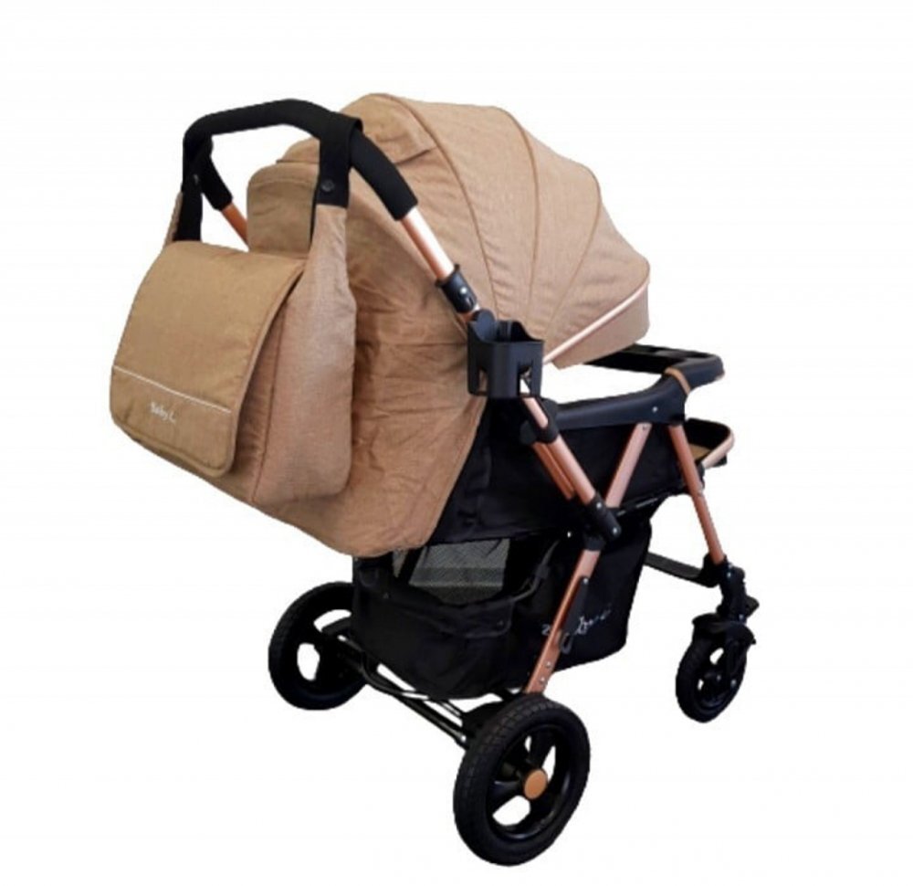 Baby Care Carucior pentru copii PRO 511 Maro Cu geanta bebe inclusa Cadru aluminiu Maner reversibil Spatar reglabil in 5 trepte Amortizoare Plasa insecte Frana picior Pliabil
