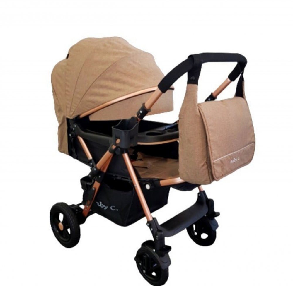 Baby Care Carucior pentru copii PRO 511 Maro Cu geanta bebe inclusa Cadru aluminiu Maner reversibil Spatar reglabil in 5 trepte Amortizoare Plasa insecte Frana picior Pliabil